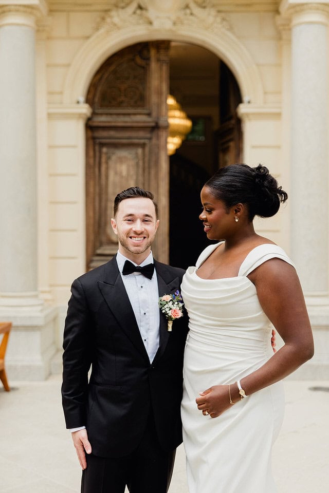 The Married couple in front of Chateau des 3 fontaines